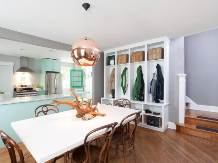 Dining room with copper lighting.