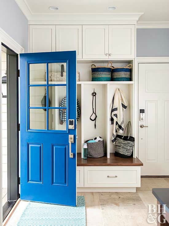 Royal blue mudroom door with Schlage Connect smart lock.