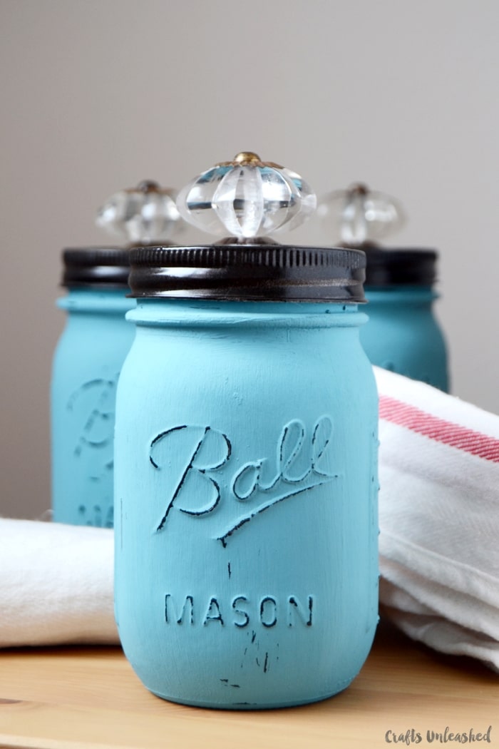 DIY storage jars with crystal knobs.