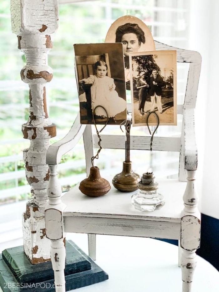 DIY photo holder using old door knobs.