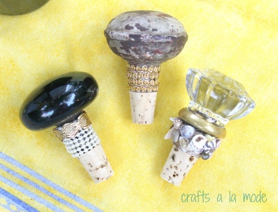 DIY wine bottle stoppers with door knobs.