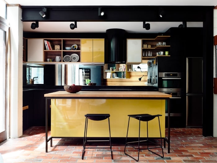 Black and yellow mid-century inspired kitchen.