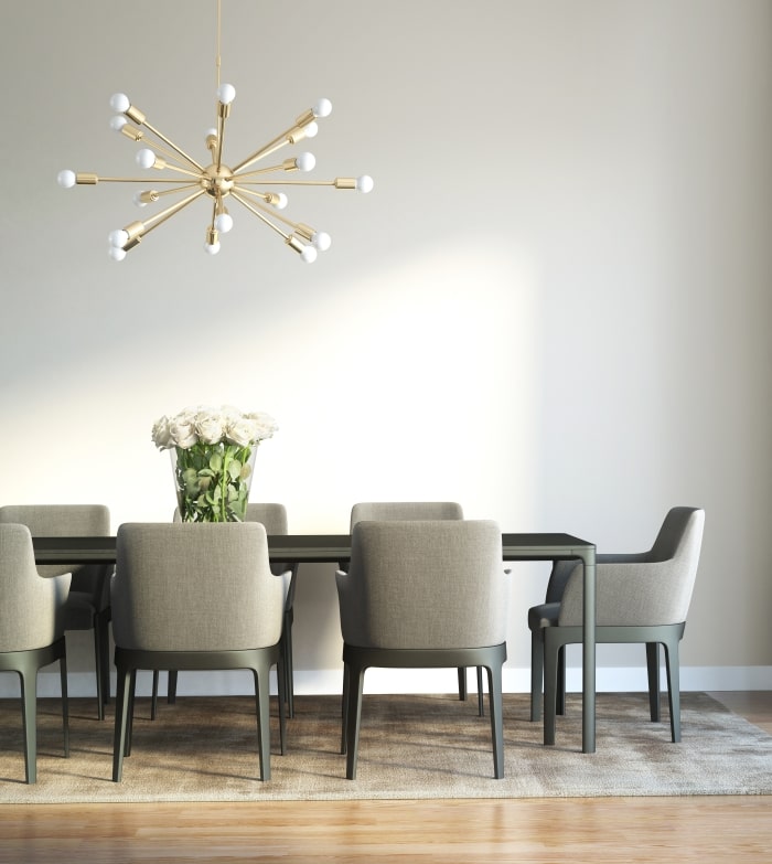 Dining room with brass sputnik lighting.