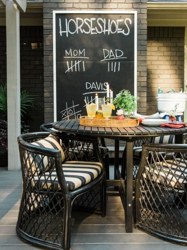 Backyard patio with oversized chalkboard.