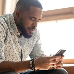 man-looking-at-smartphone