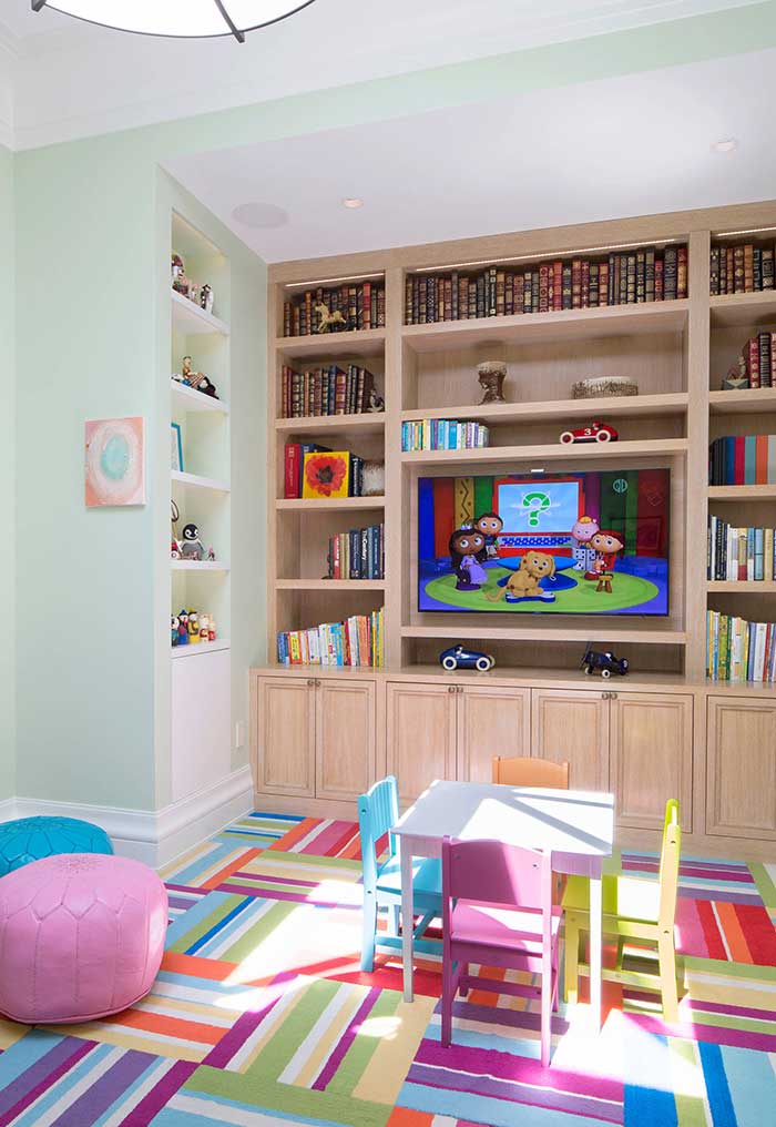 Colorful kids playroom with carpet tiles.