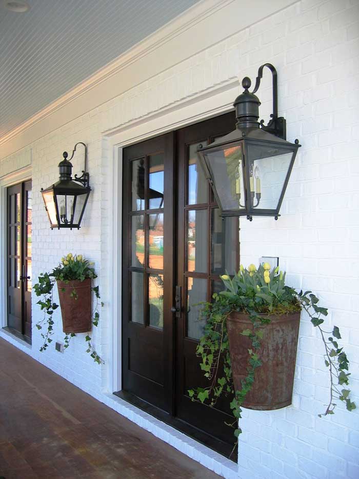 Upcycled farming basket turned front door planters