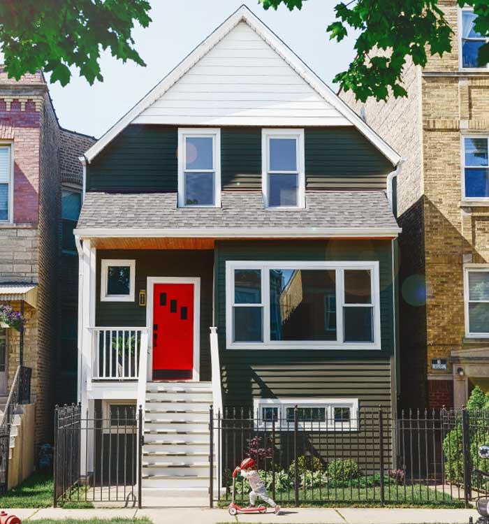 Yellow Brick Home Two Flat porch remodel after.