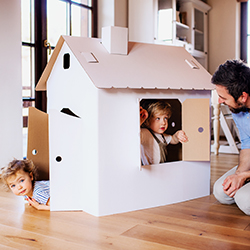 two-toddler-children-with-father-playing-in-cardboard-house-indoors-at-home-250
