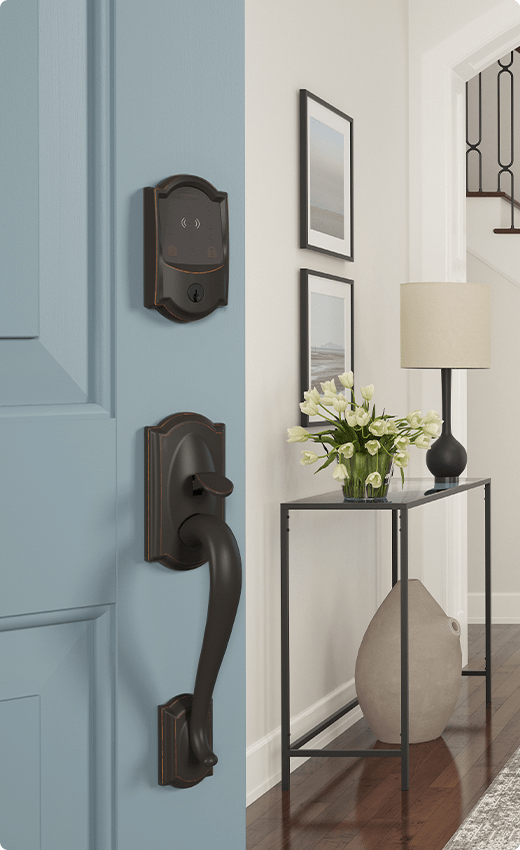 Schlage Encode plus wifi smart lock on blue front door.