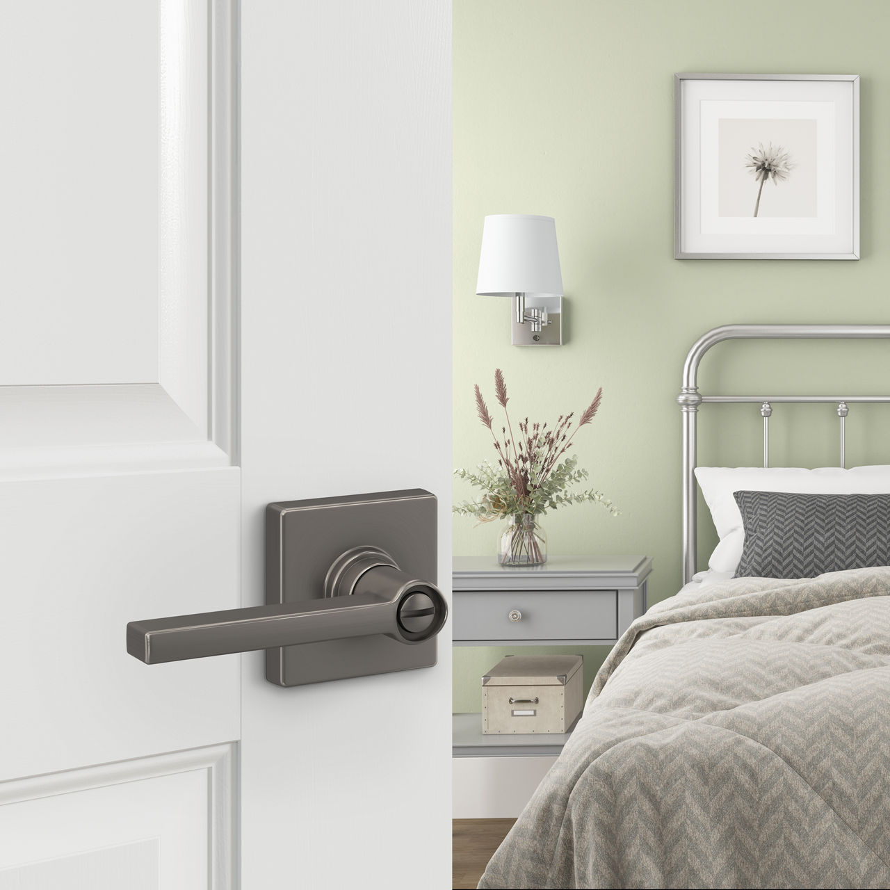 Schlage Home Essentials Hendrix Bed and Bath Locking Door Lever with Crawley Trim