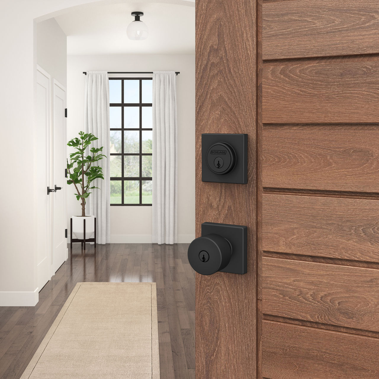 Schlage Home Essentials Single Cylinder Deadbolt and Realm Keyed Entry Door Knob with Crawley Trim