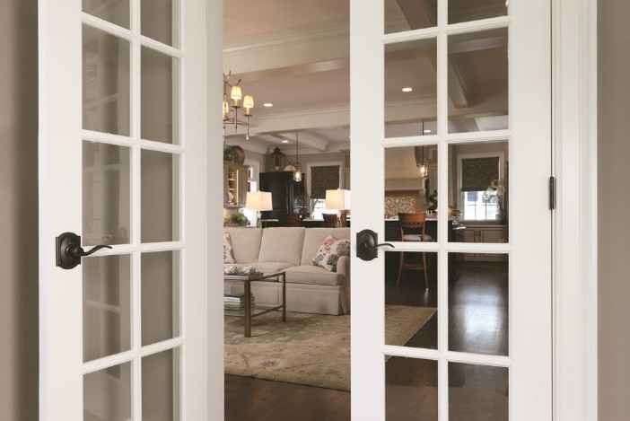 Modern updates - Glass french doors - Accent lever - Schlage